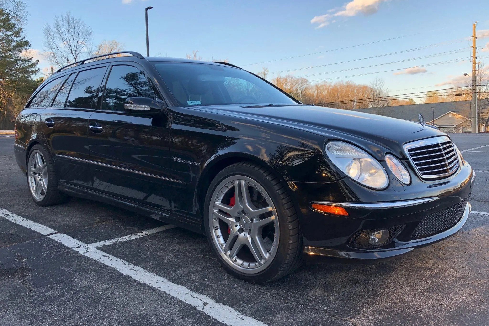 Black 2005 Mercedes E55 AMG Wagon on the parking lot