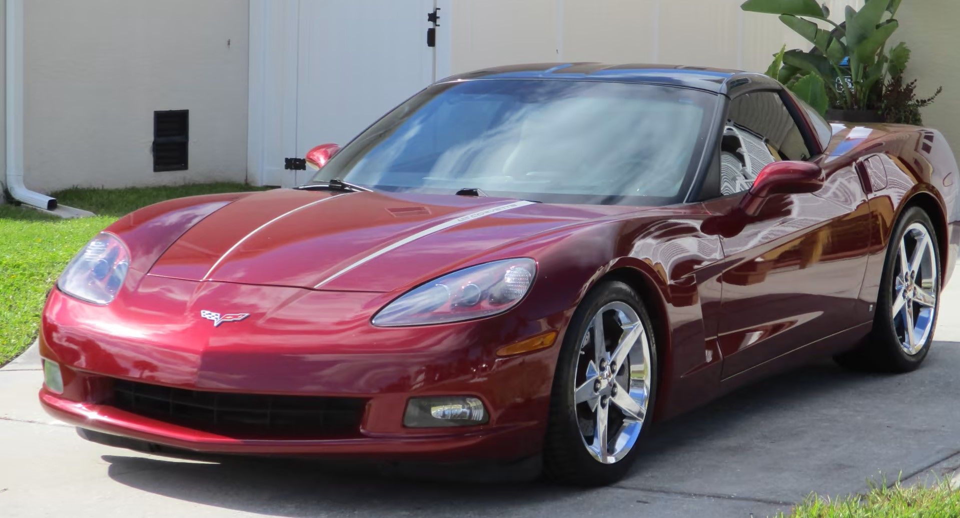 Red 2007 Chevrolet Corvette Coupe, parked