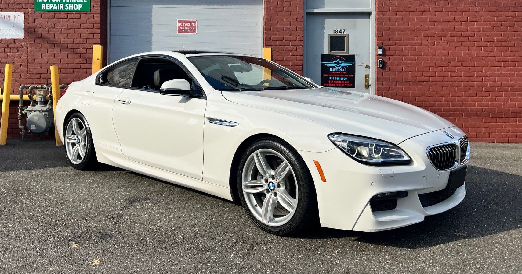 2016 BMW 640i in white front third quarter view