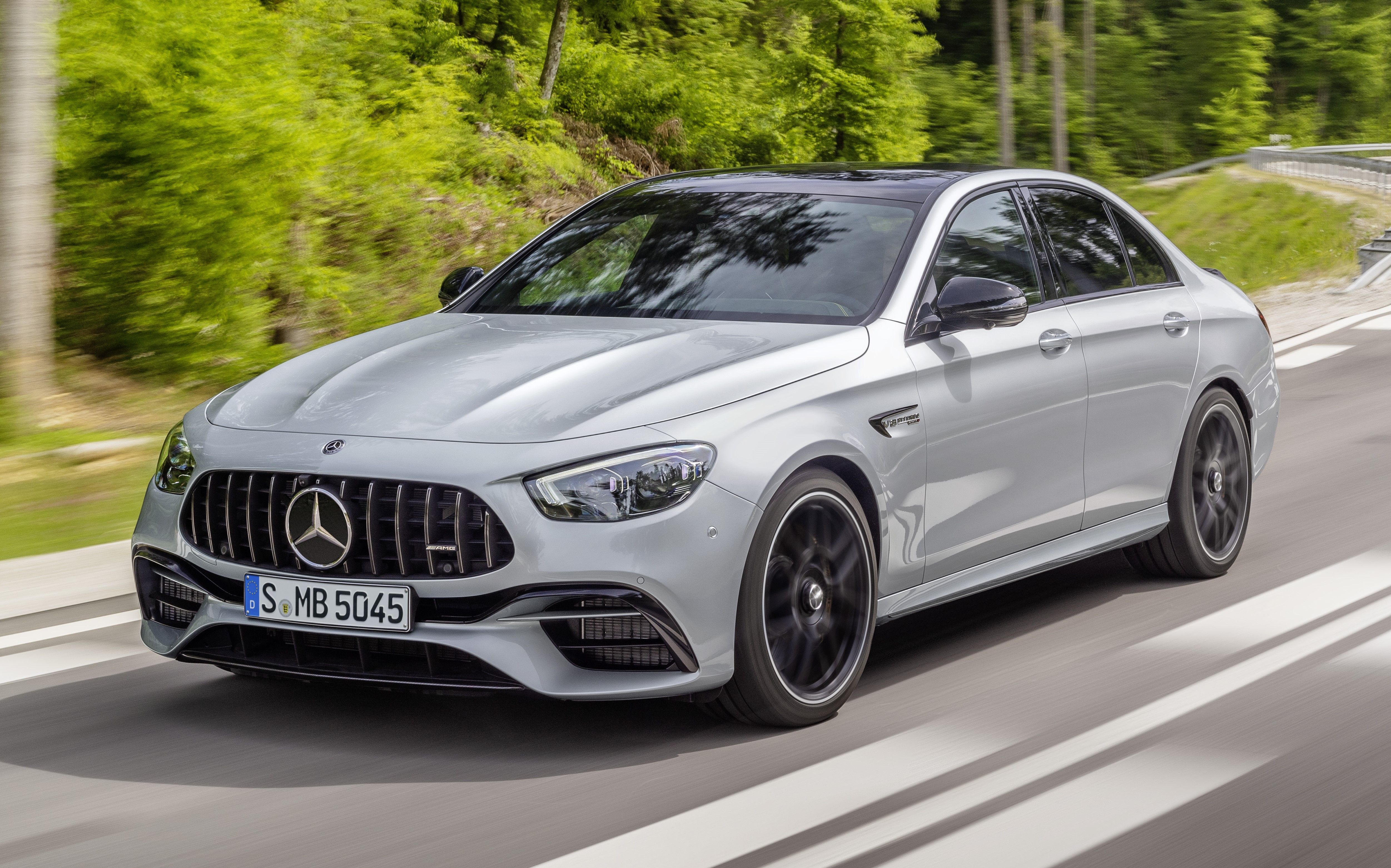 Silver 2023 Mercedes-AMG E63 S driven on the road