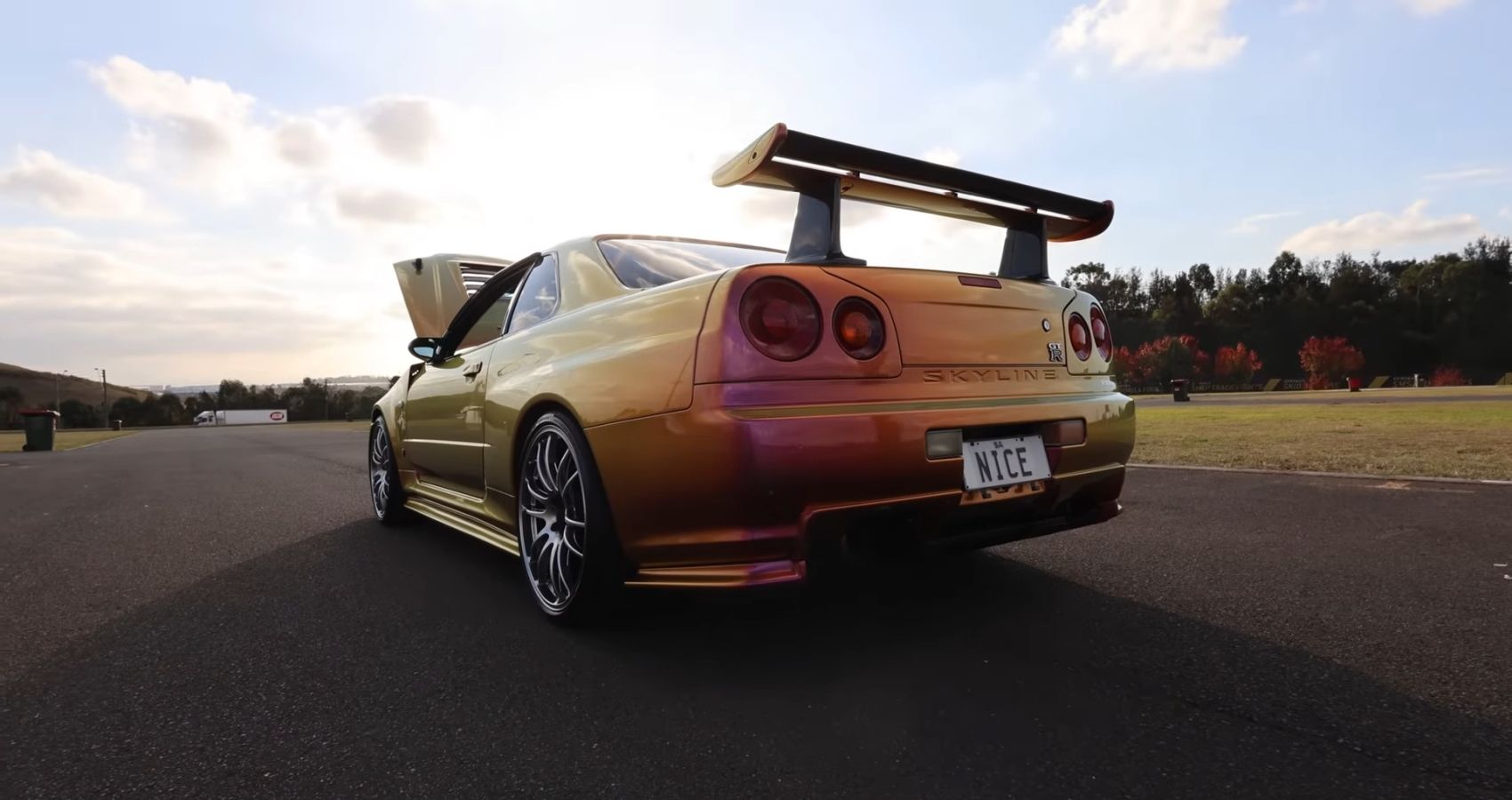 PPG Color Nissan R34 GT-R rear view low down