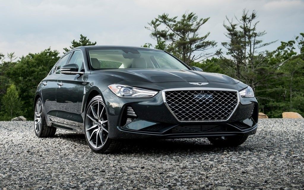 Black 2019 Genesis G70 3.3T on rocky road