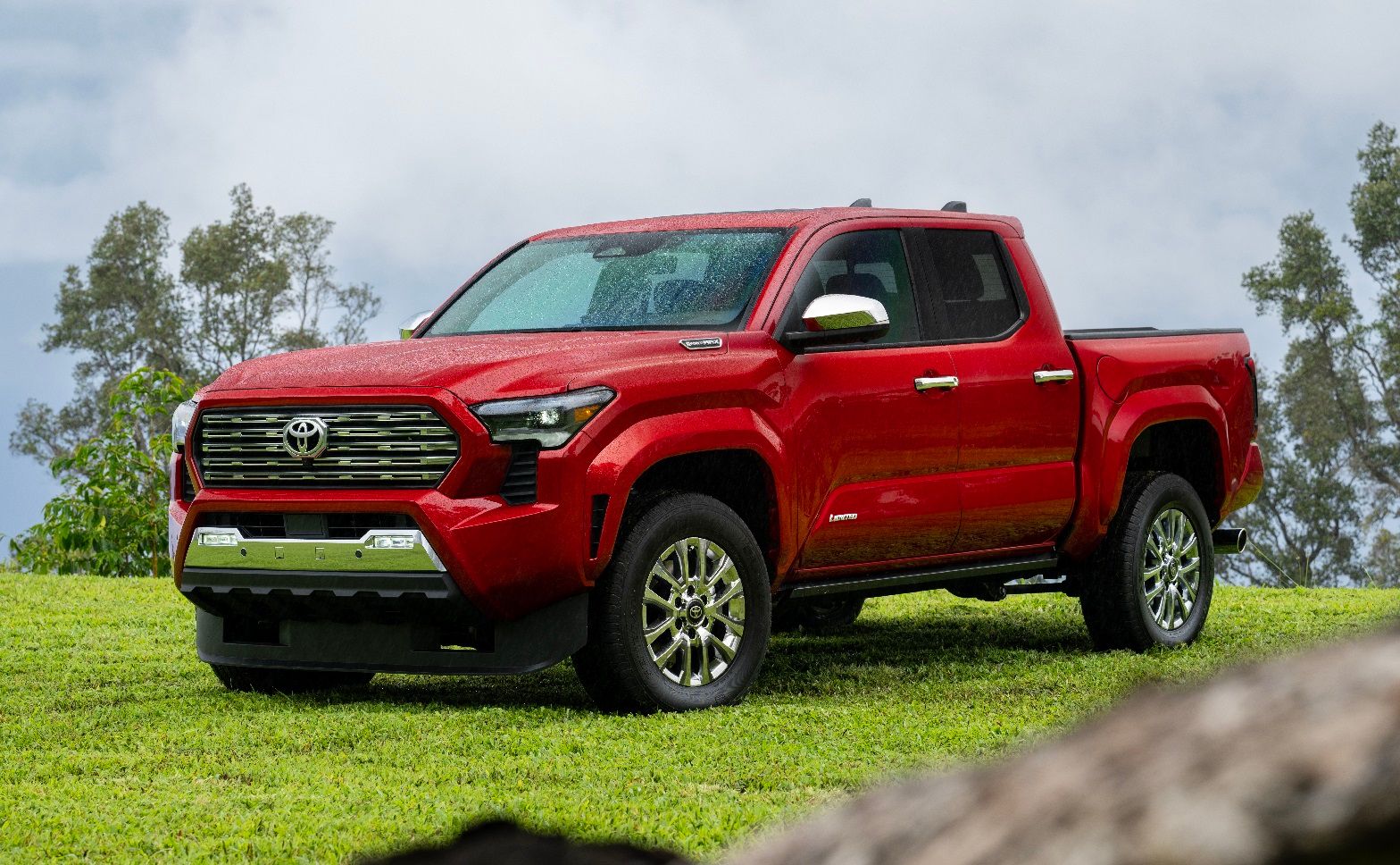 2024 Toyota Tacoma Limited, front-quarter view, parked outside.