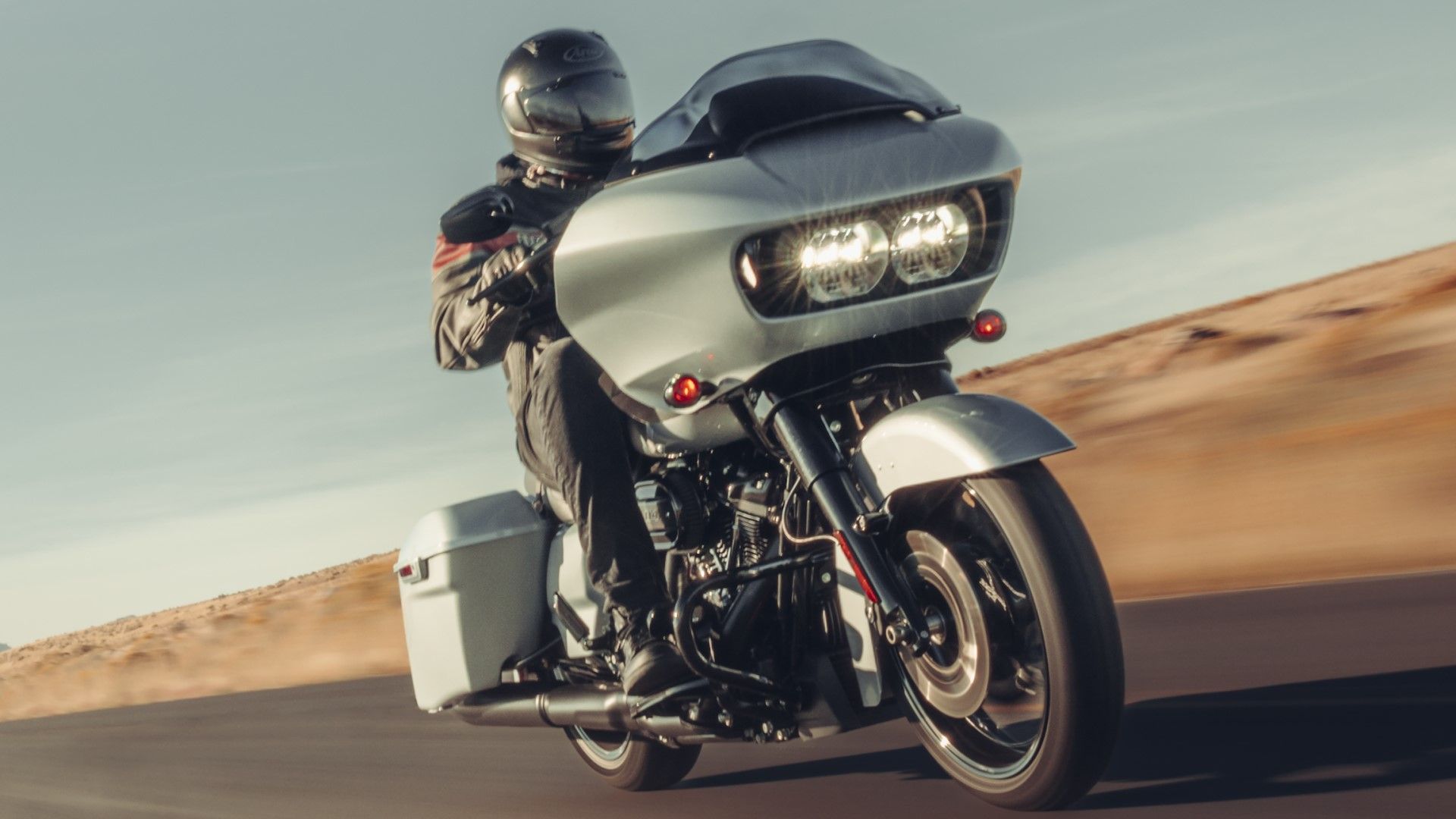 Harley-Davidson Road Glide front third quarter accelerating view