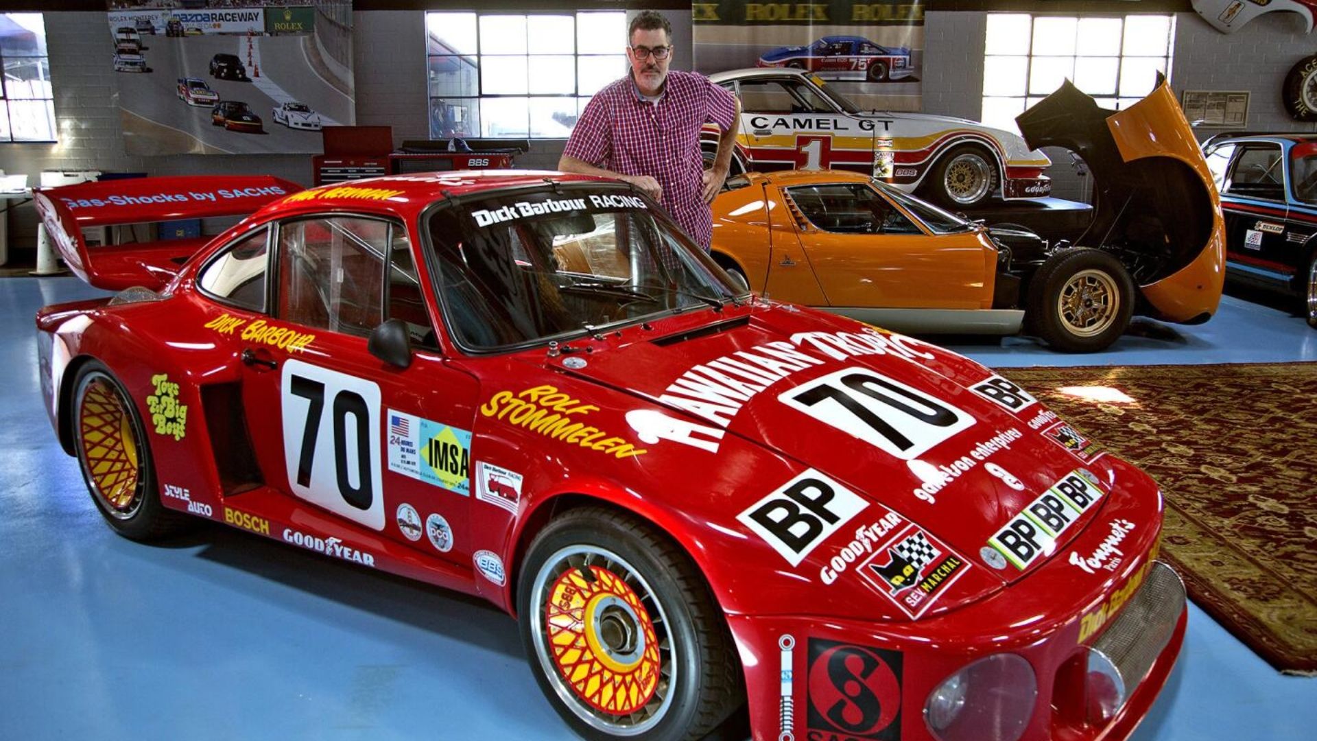 Adam Carolla with Porsche 935 owned by Paul Newman