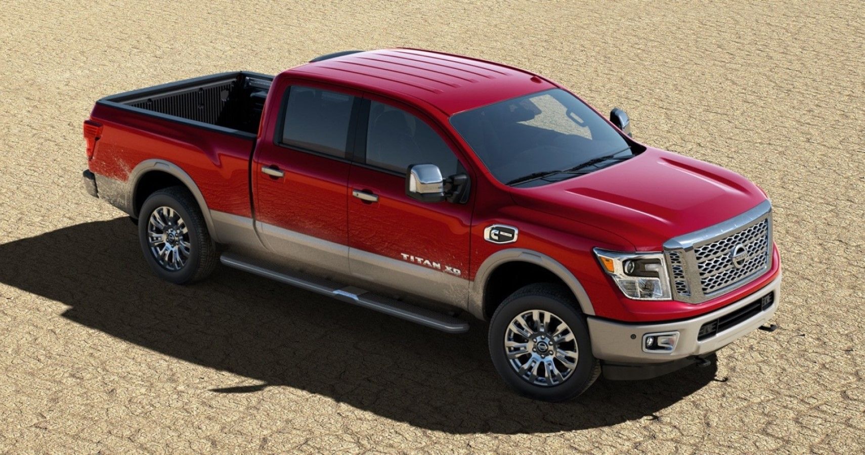Nissan Titan XD Cummins diesel V8 caminhonete em frente vermelha vista ariel do terceiro trimestre
