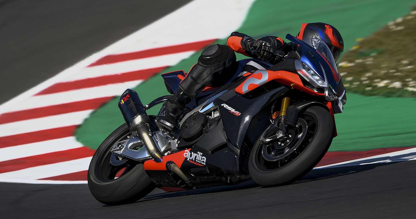 Black and red Italian superbike on track