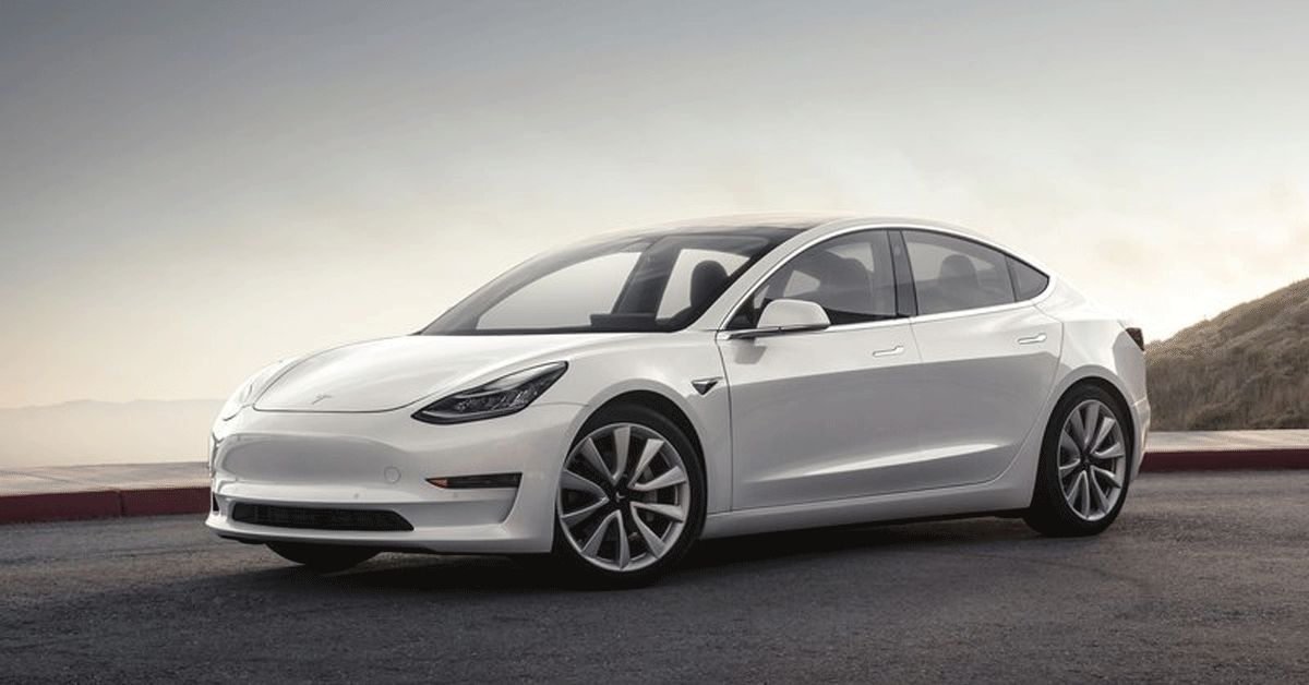 White 2018 Tesla Model 3 parked outside