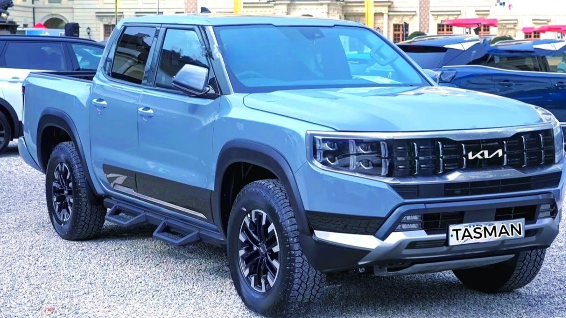 A light blue rendering of the 2025 Kia Tasman Pickup Truck