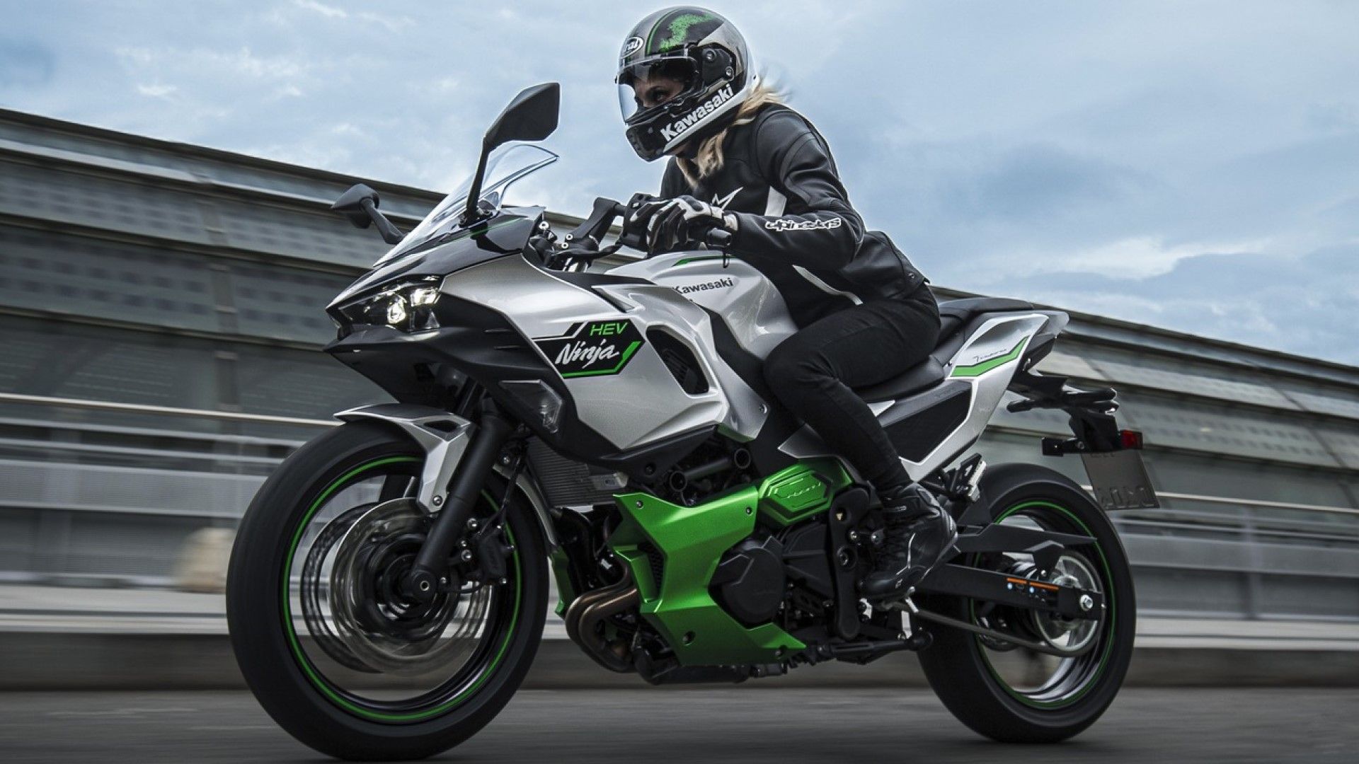 All-new 2024 Kawasaki Ninja 7 Hybrid motorcycle front third quarter accelerating view