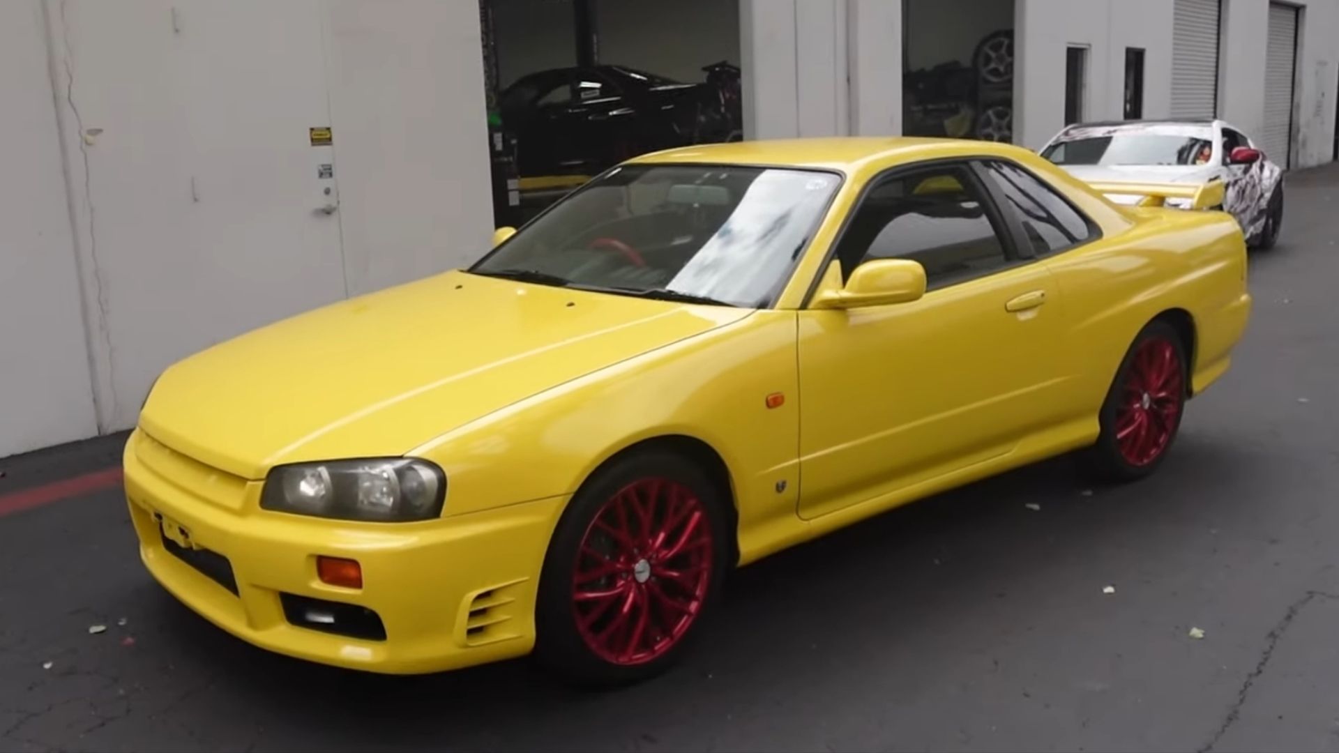 Nissan GT-T R34 Yellow Front Quarter View