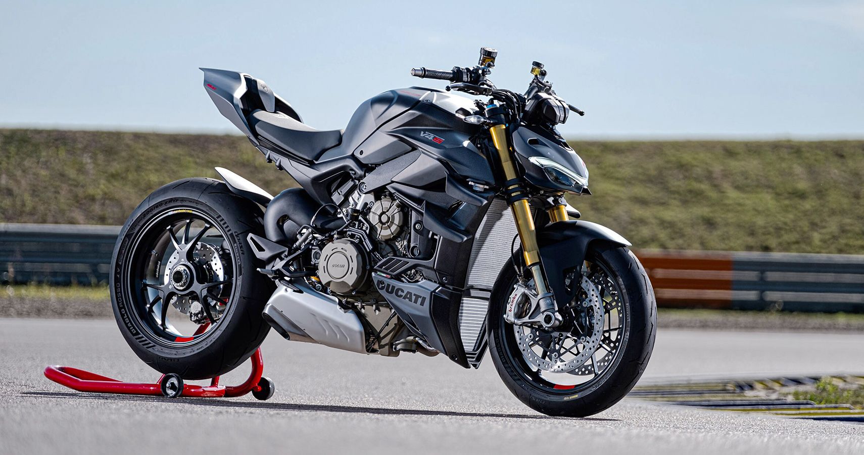 Motocicleta hiper nua italiana cinza