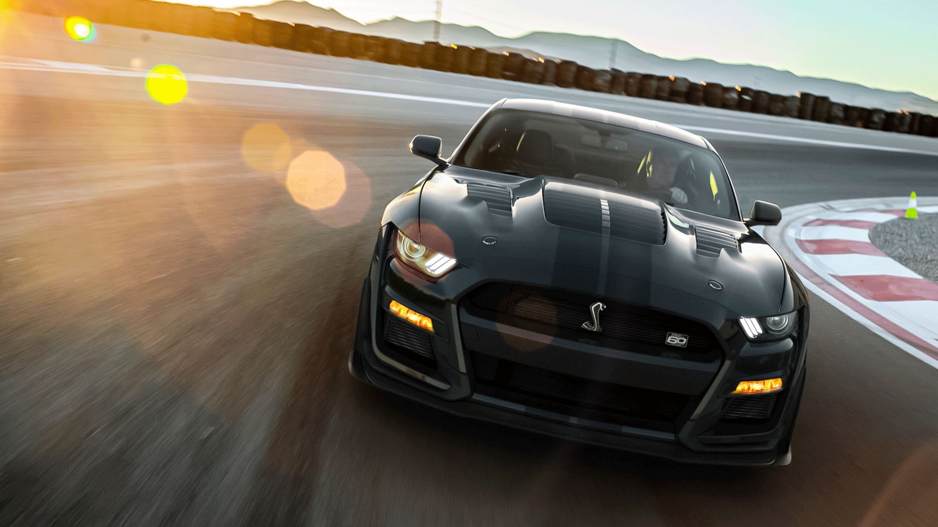 Black 2020-2022 Ford Mustang Shelby GT500KR driving on track