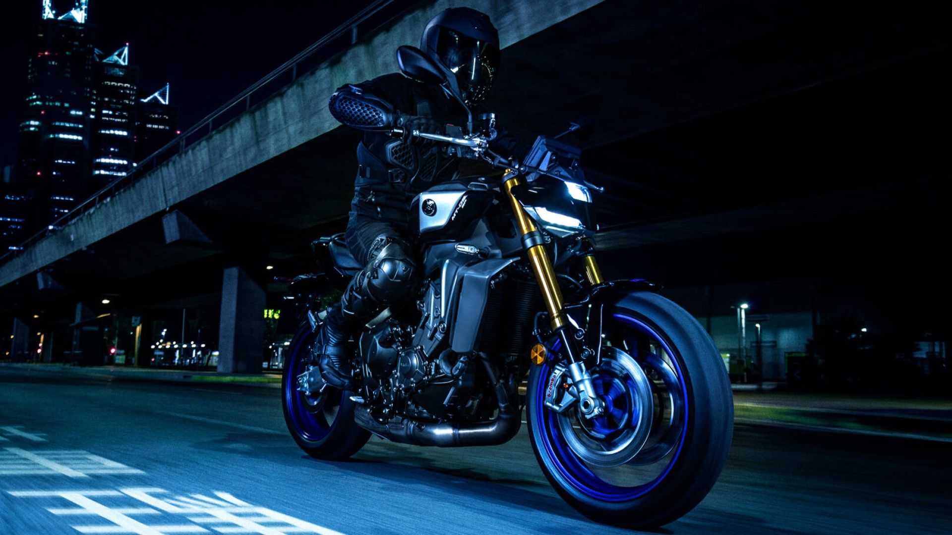 2024 Yamaha MT-09 SP accelerating at night