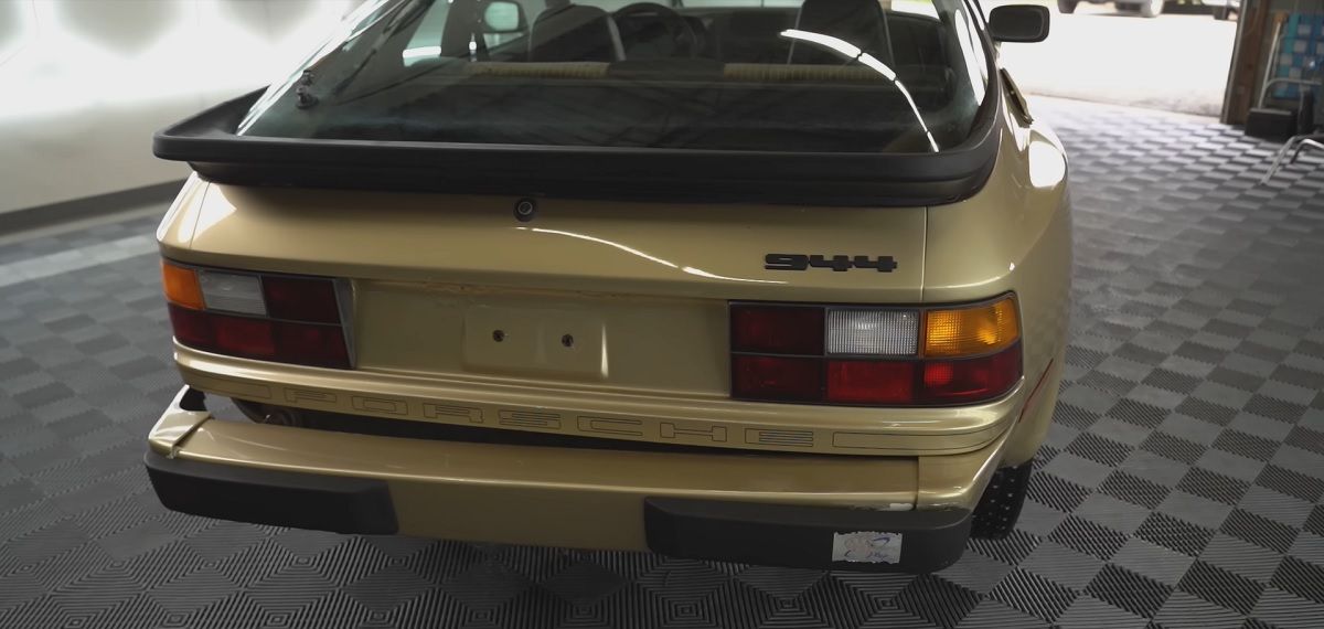 Gold Porsche 944 body polished rear