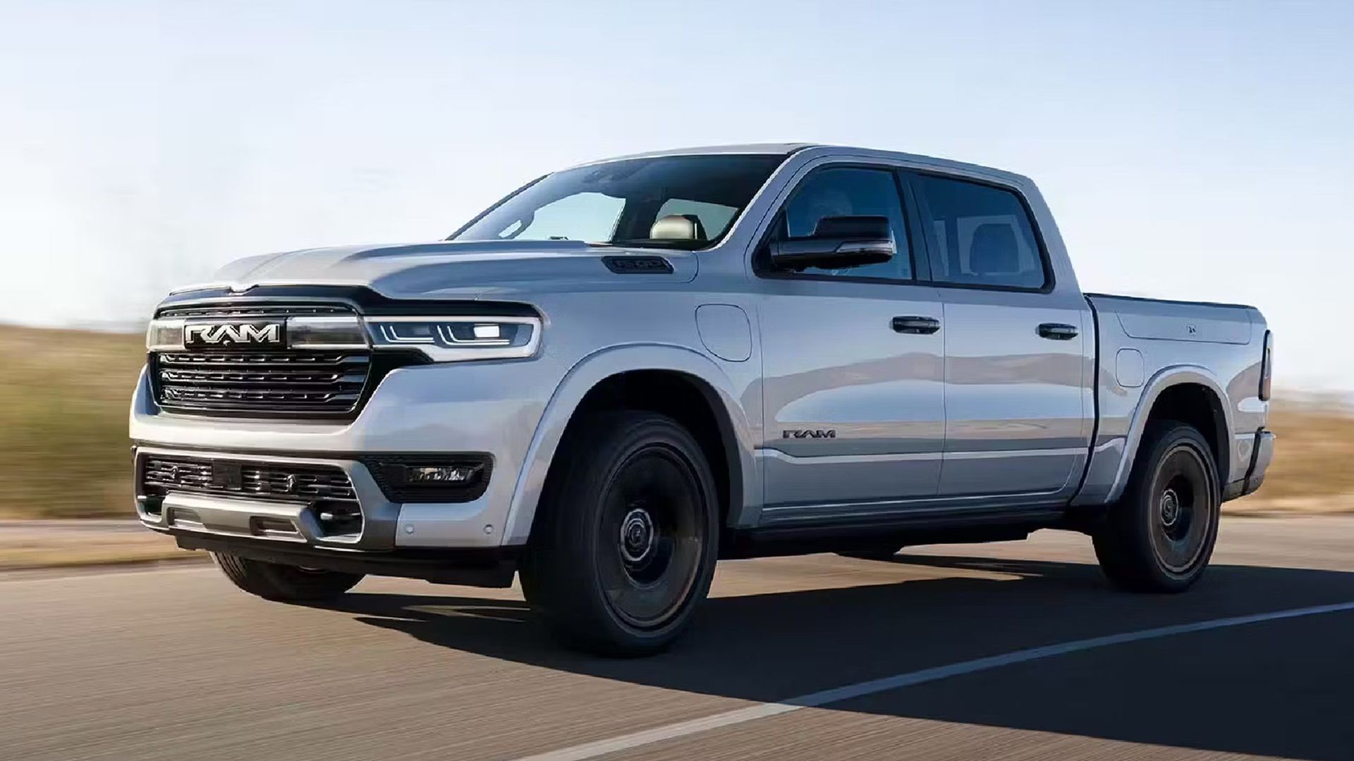 2025 Ram 1500 Ramcharger Silver Driving