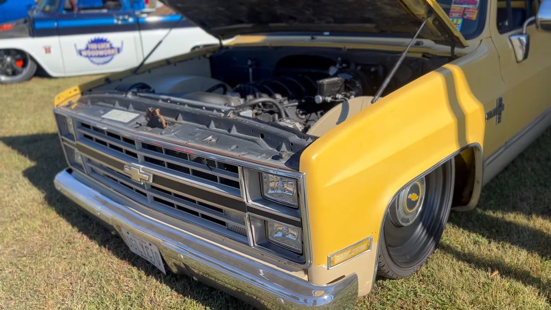 A two tone Chevrolet C10 Squarebody camper shell LS swap