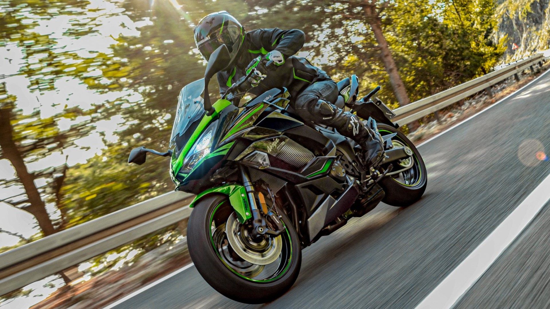 2023 Kawasaki Ninja 1000SX cornering on mountain roads 