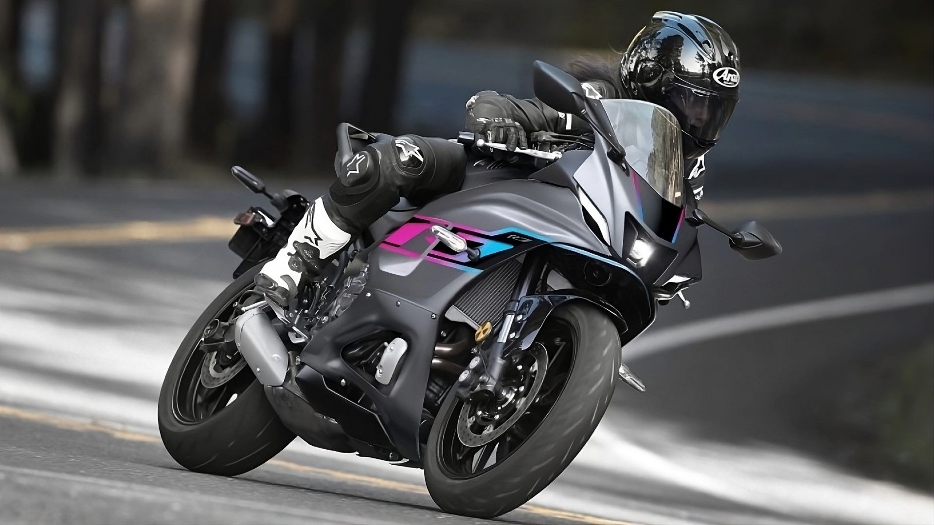 2024 Yamaha R7 in a cool color cornering view