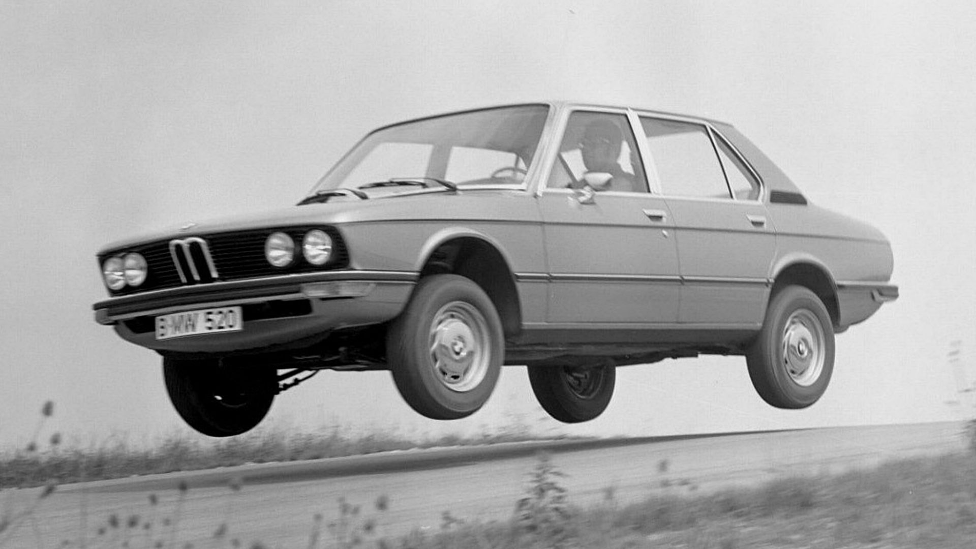 BMW 5-Series 520 E12 1972 jumping