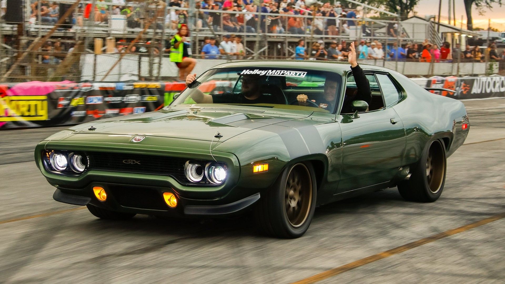 A F8 Green 1971 Plymouth GTX restomod front quarter shot 