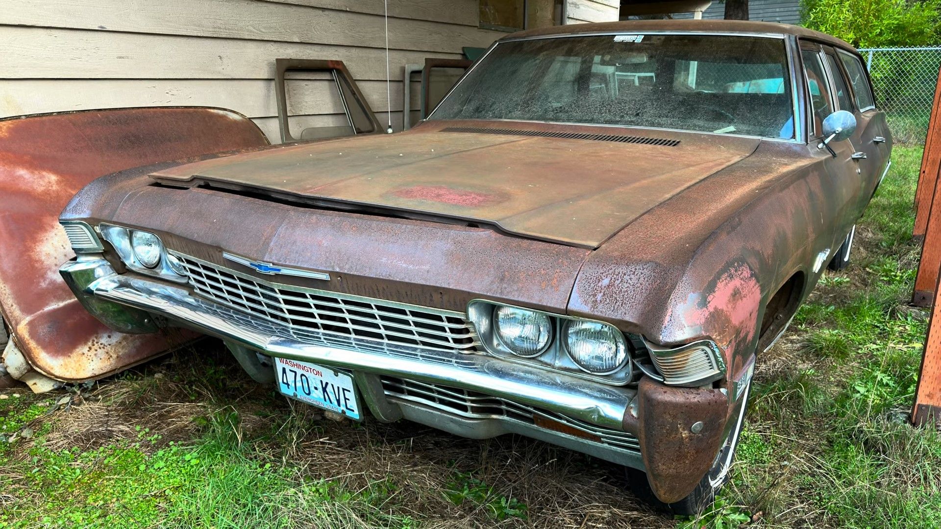 A rusty 1968 Chevrolet Biscayne Wagon 396 front quarter shot