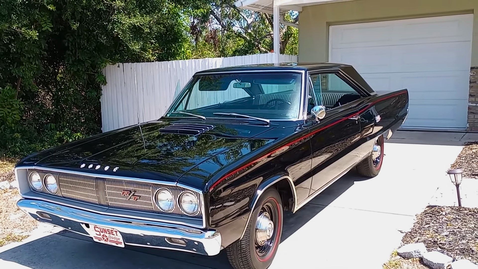 A black 1967 Dodge Coronet R/T 440 Magnum front quarter shot