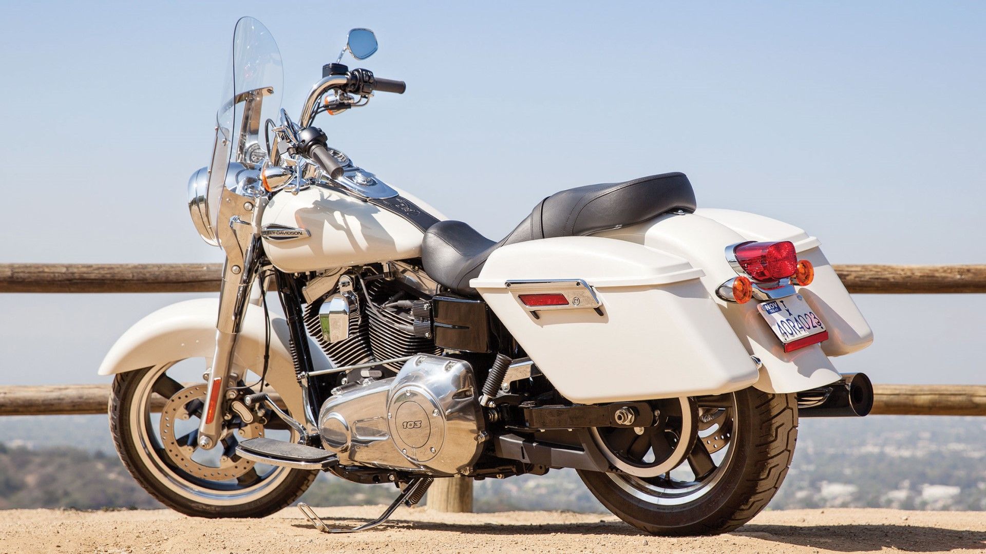 2014 Harley-Davidson Switchback in white rear third quarter view