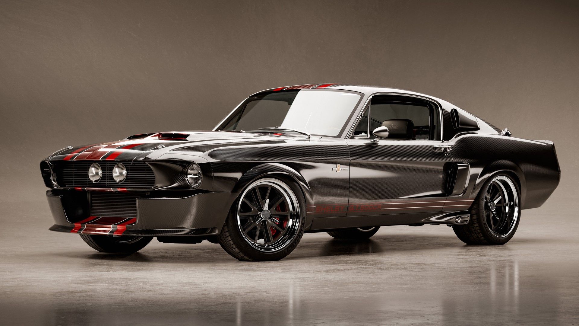 A carbon and red 1967 Ford Mustang Shelby GT500CR Centennial Edition by Classic Recreations front quarter shot