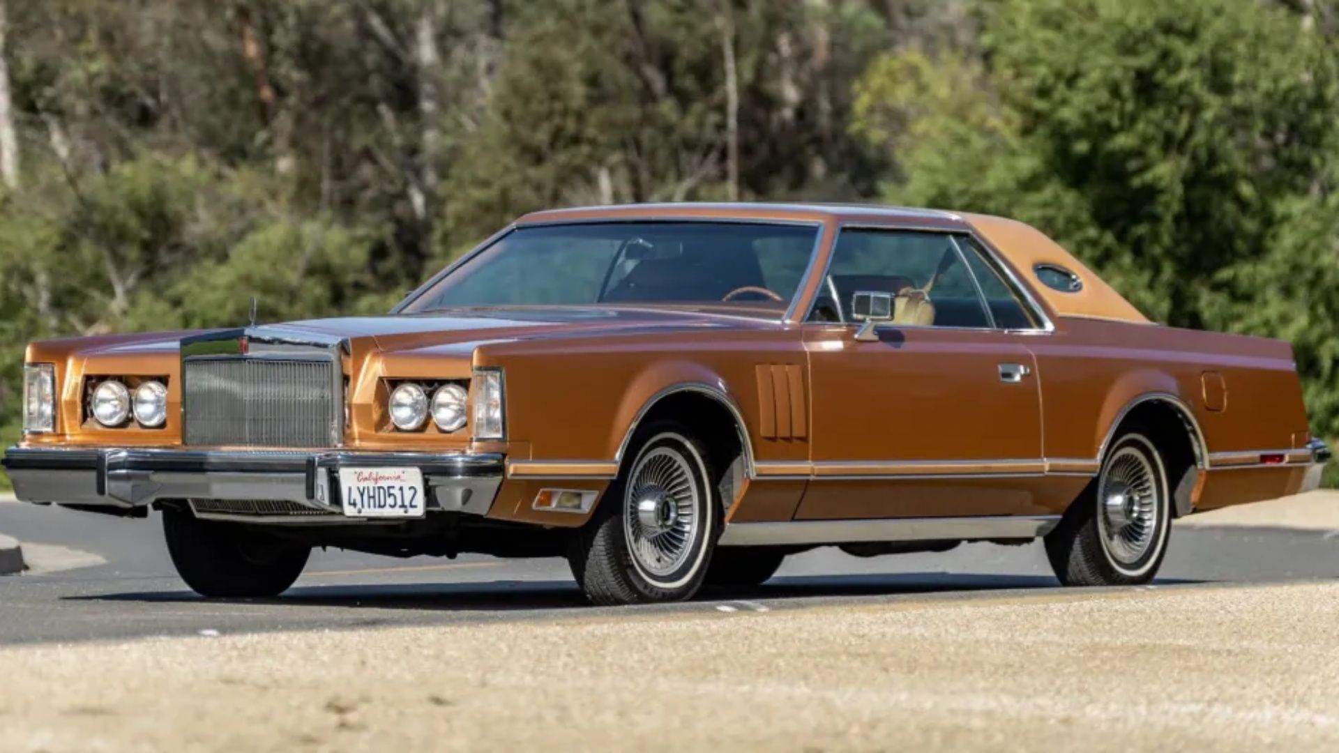 Image of a deep orange 1978 Lincoln Continental Mark V-1