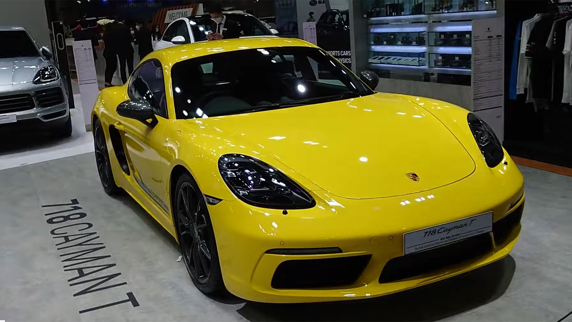 yellow 2023 Porsche 718 Cayman T parked