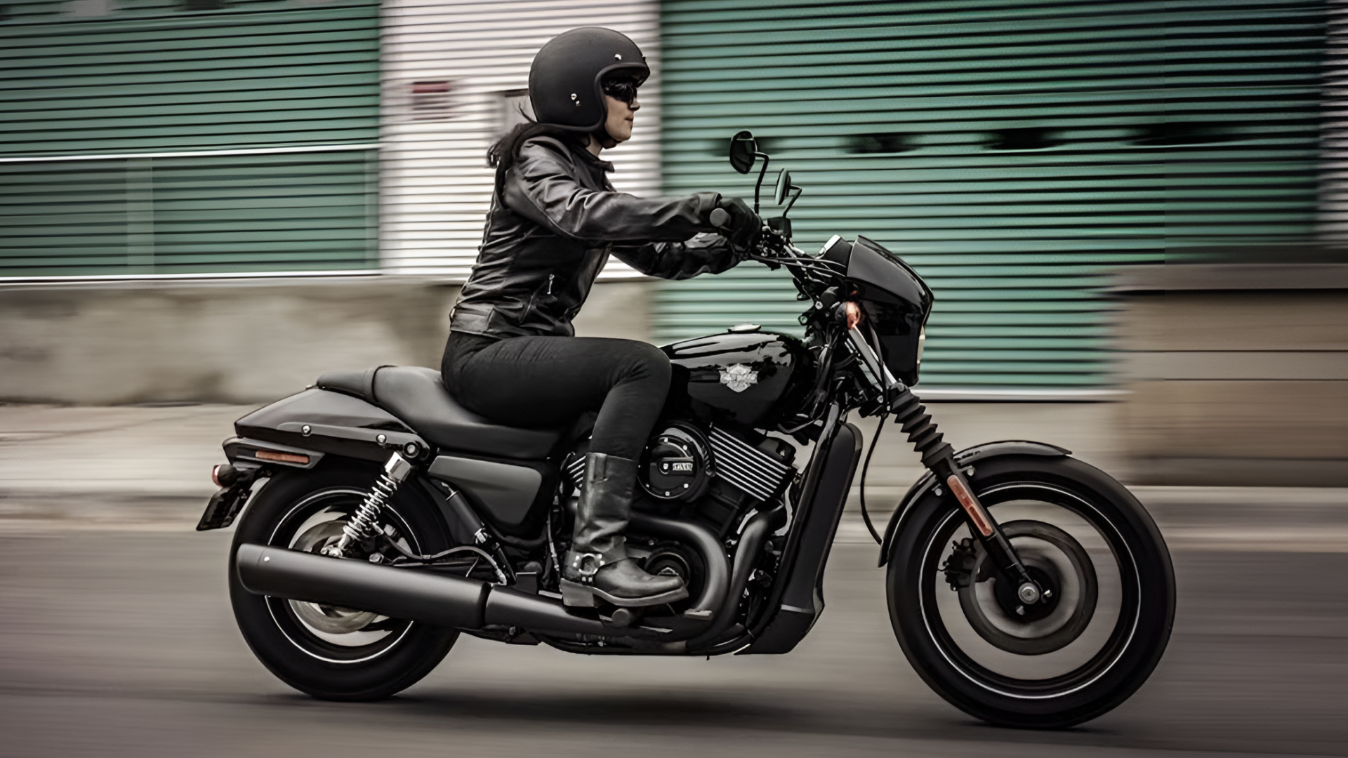 Harley-Davidson Street 750 accelerating side profile view