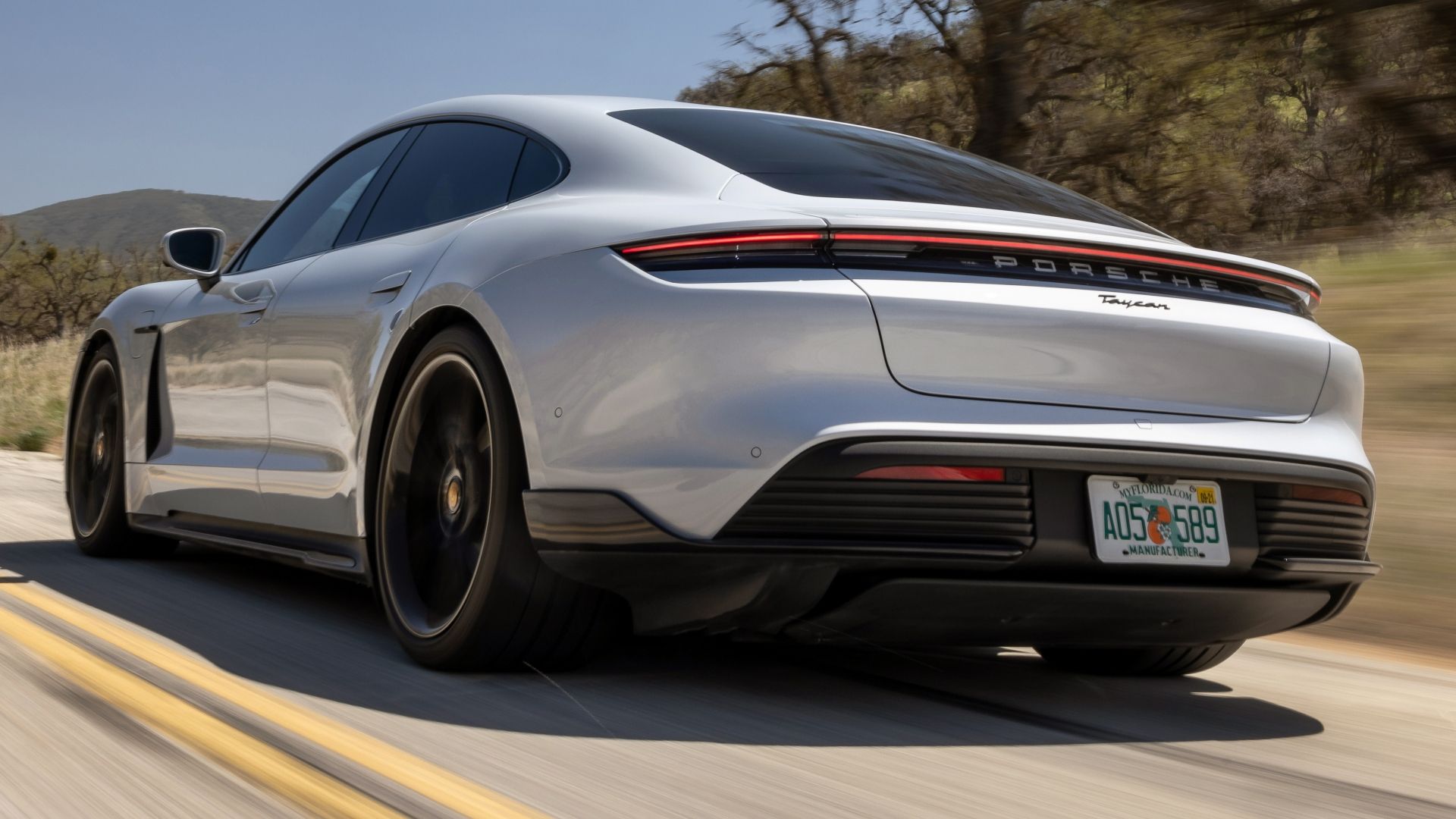 porsche taycan rear quarter white