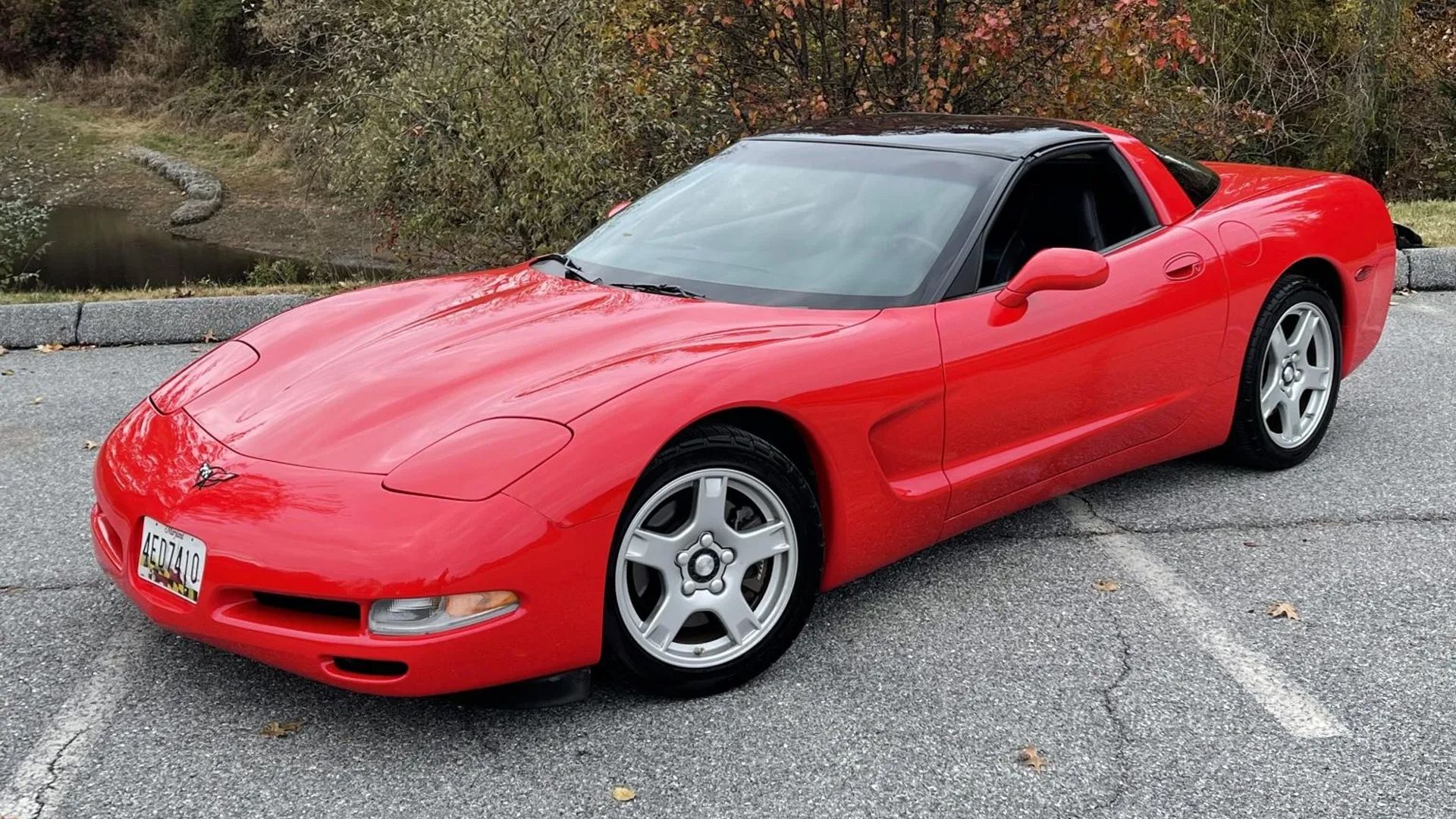 red 1997 Chevrolet Corvette Coupe parked