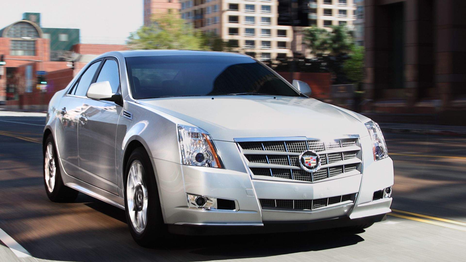 silver 2012 Cadillac CTS driving