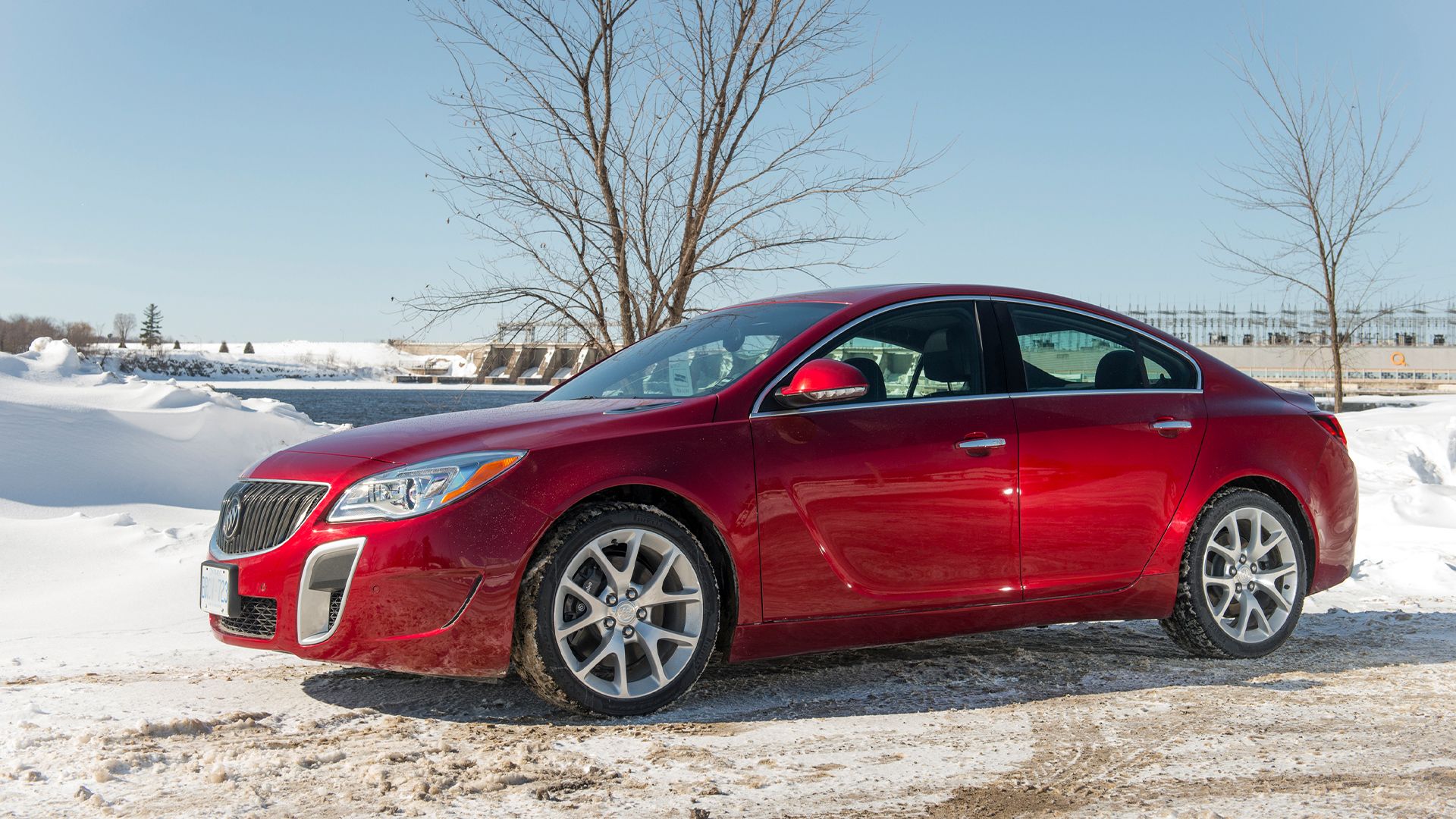 red 2014 Buick Regal GS AWD parked on snow