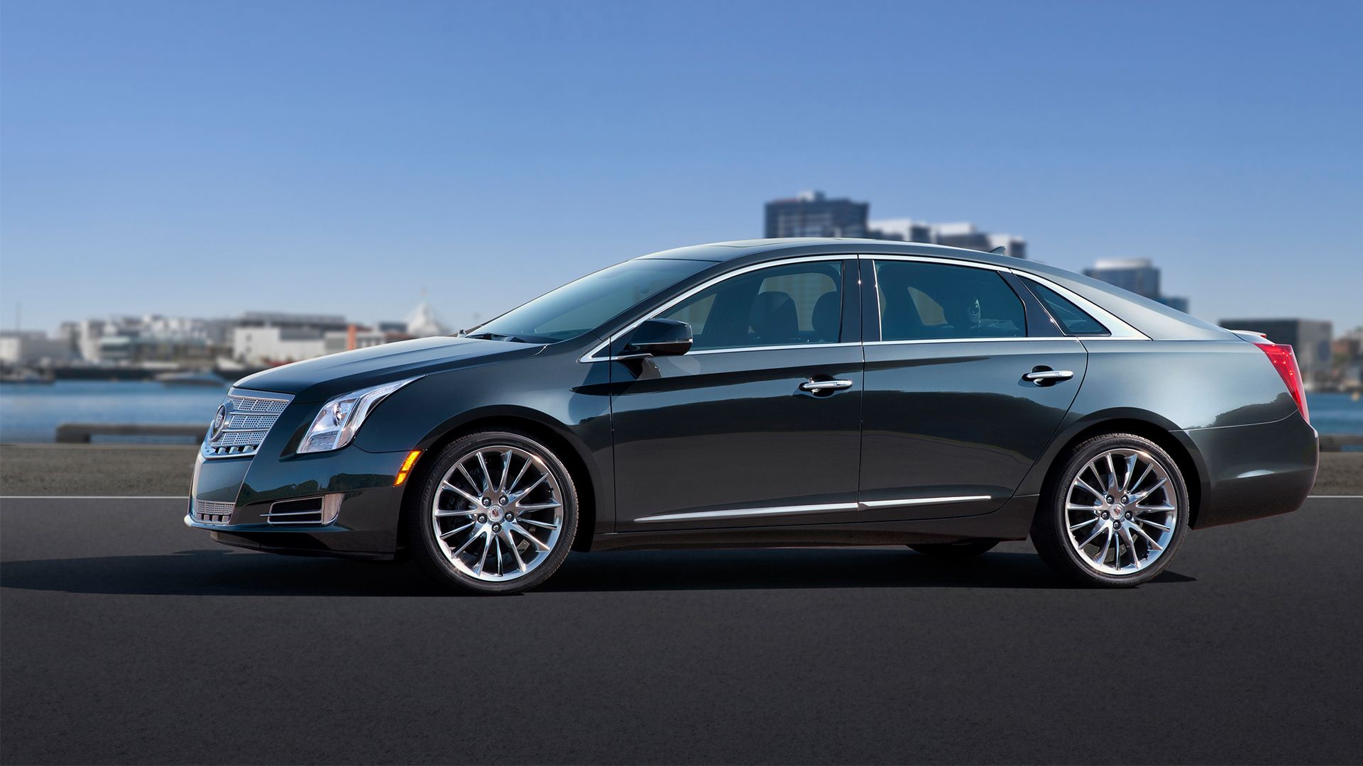 dark green 2014 Cadillac XTS parked