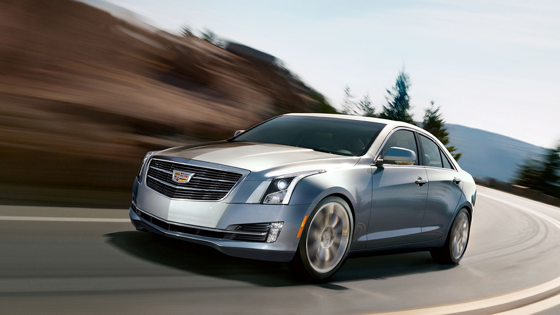 silver 2015 Cadillac ATS driving