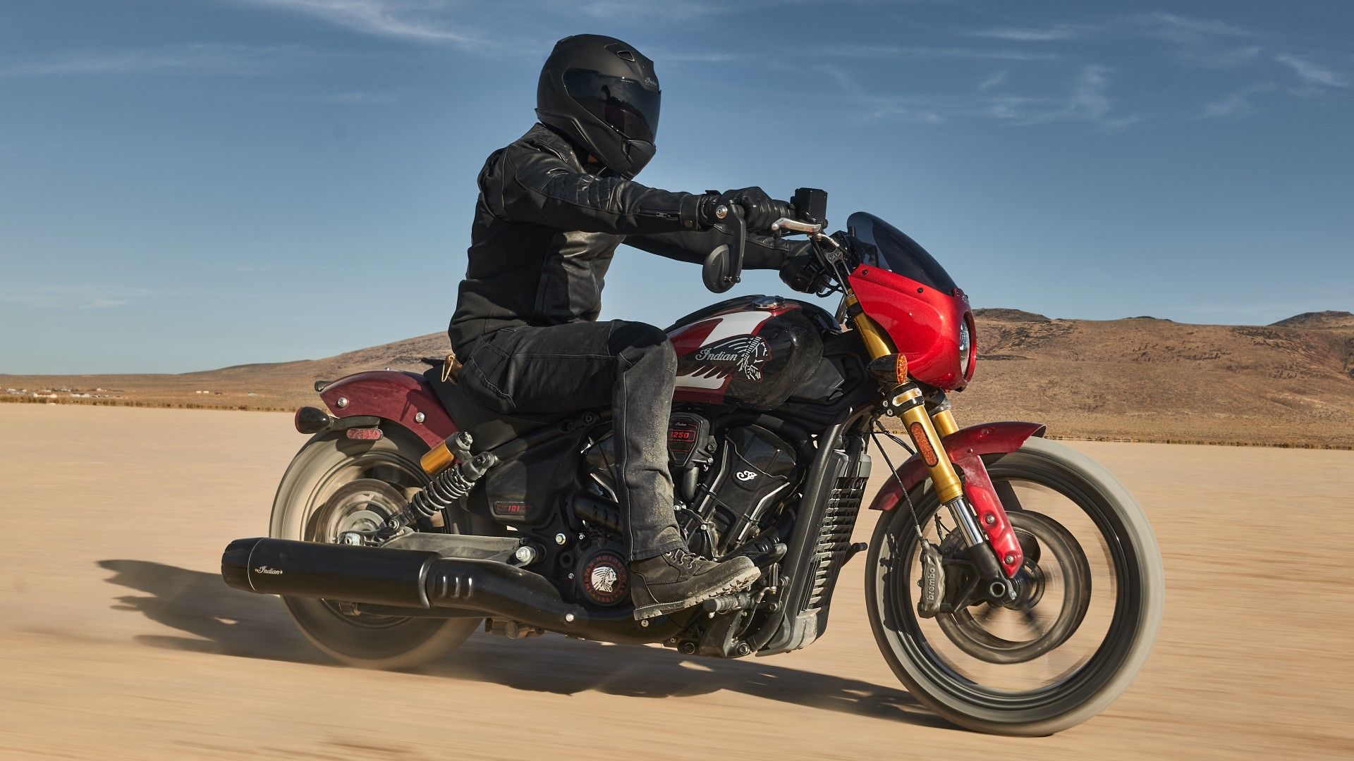 2025 Indian Scout 101 accelerating off the road side profile view