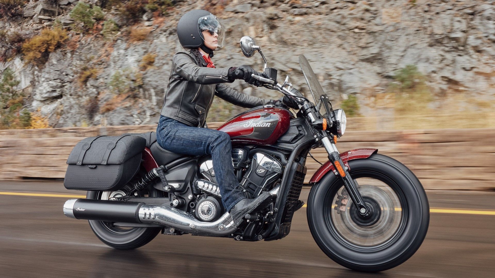 2025 Indian Super Scout loaded with accessories accelerating side profile view