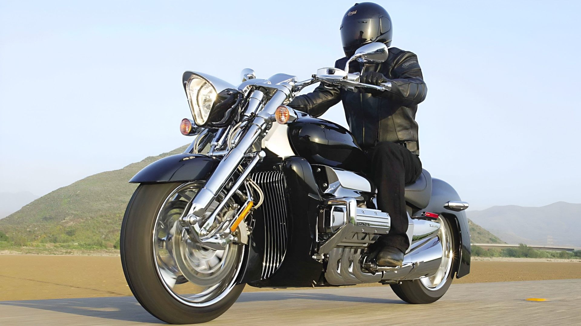 2004 Honda Valkyrie Rune accelerating on the road front third quarter view