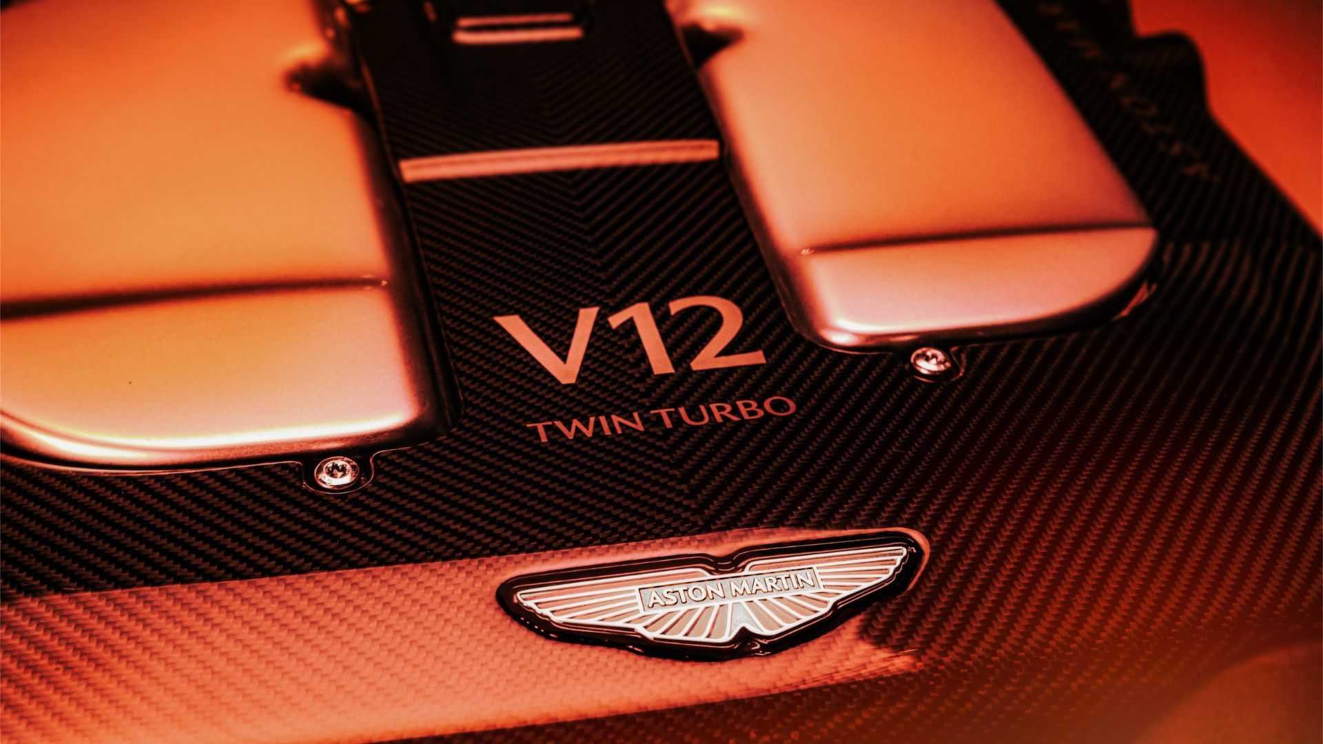 The aston martin v12 mercifully lives on