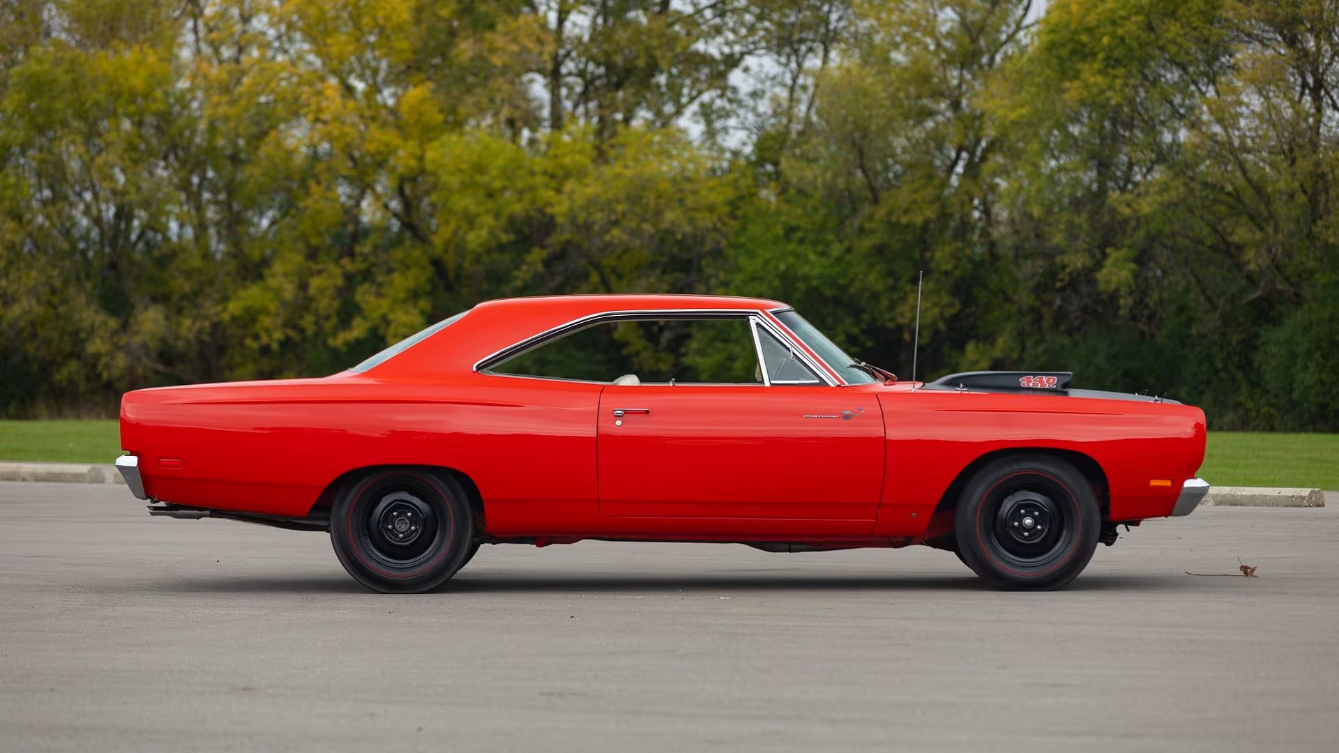 Lado Road Runner A12 vermelho 1969