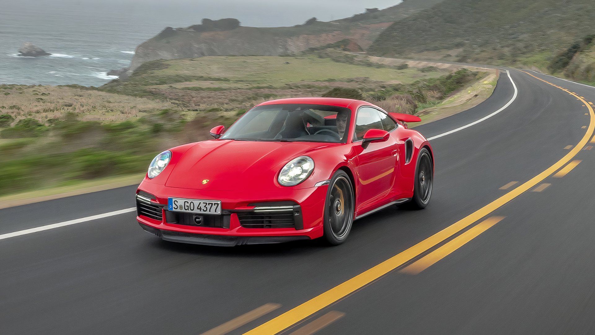 2021 porsche 911 turbo s front quarter driving