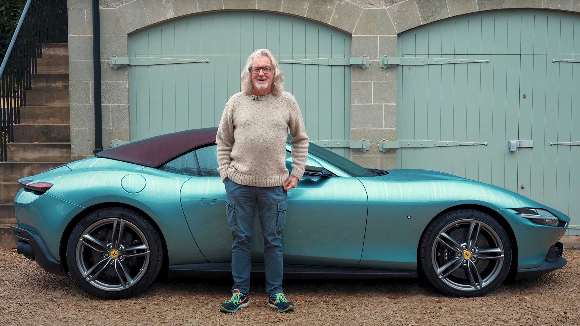 james may and ferrari roma in side view