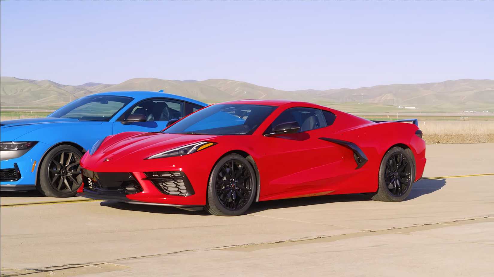 American muscle meets American precision: comparison image showing Mustang versus Corvette rivalry energy