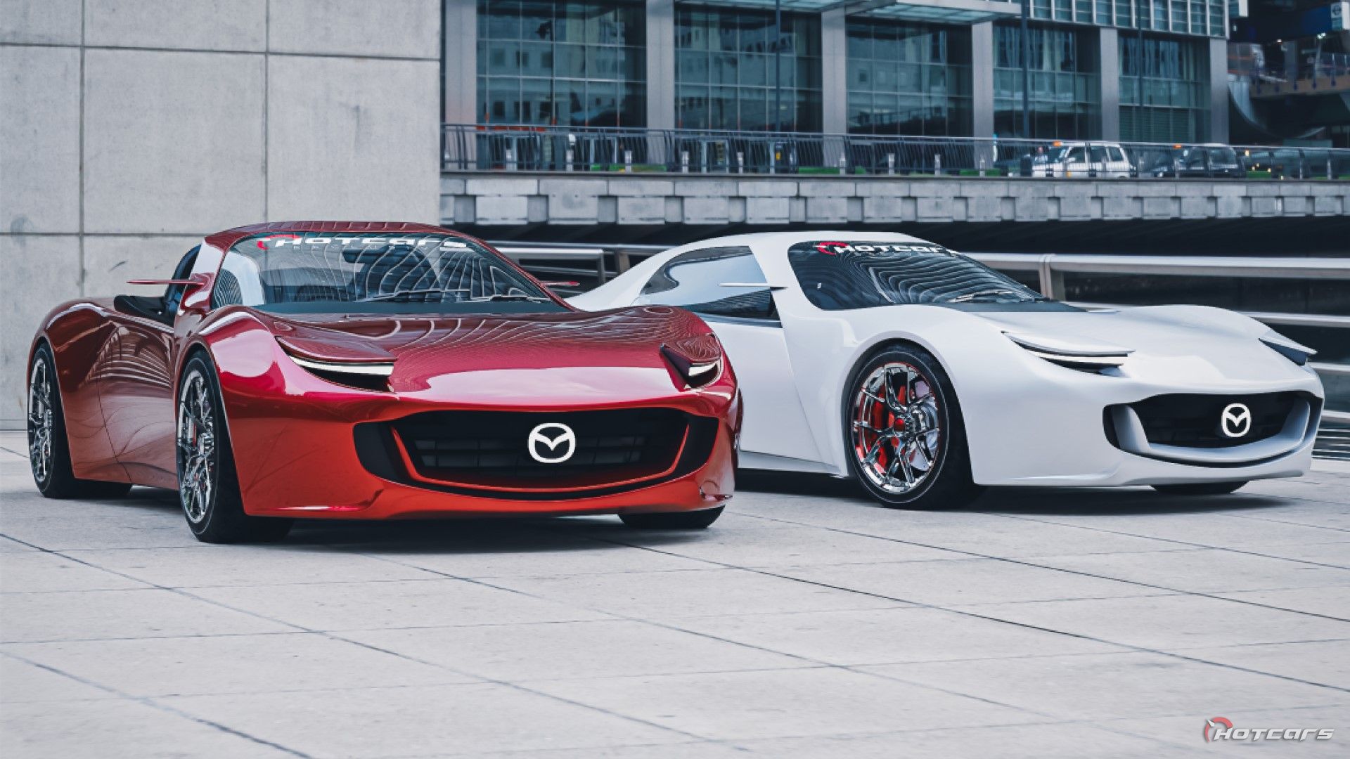 HotCars Car Renders Mazda MX5 EV Concept, front quarter view of 2 cars